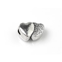 Kovové korálky 13 x 8 mm (otvor 4 mm)